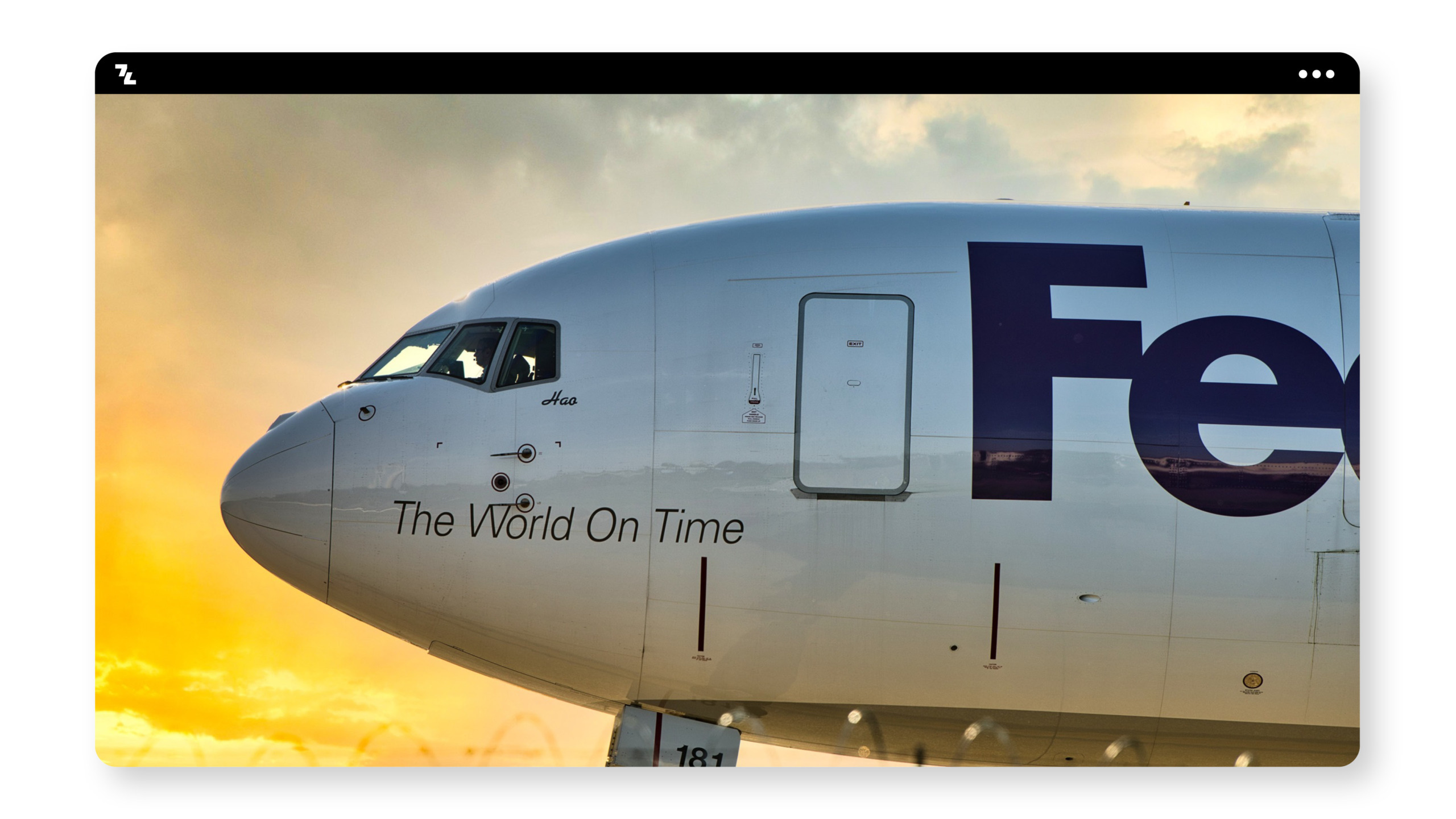 A FedEx plane is stationed at the airport, showcasing its unique selling proposition (USP) in logistics.