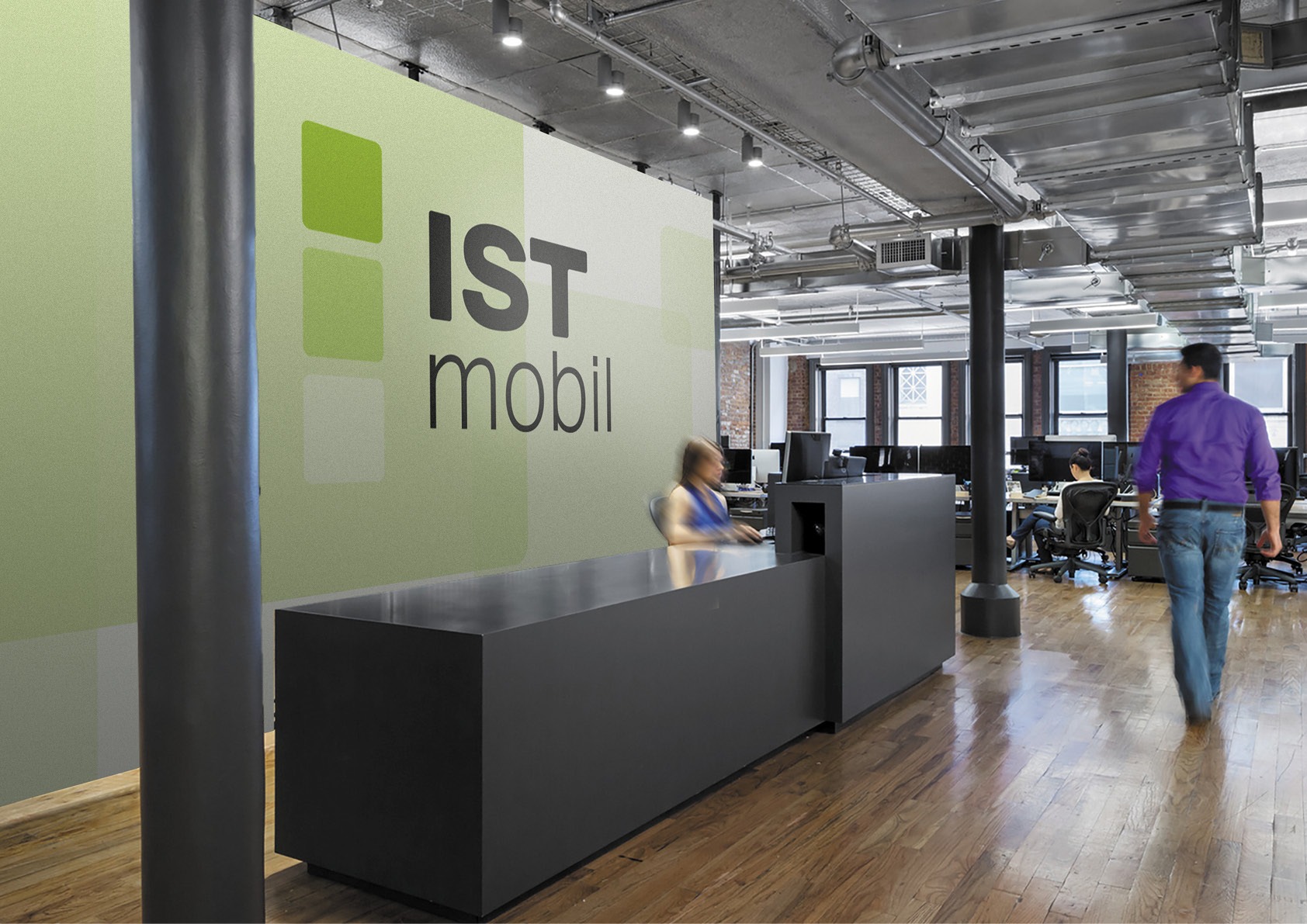 An office with a sign that says ISTmobil.