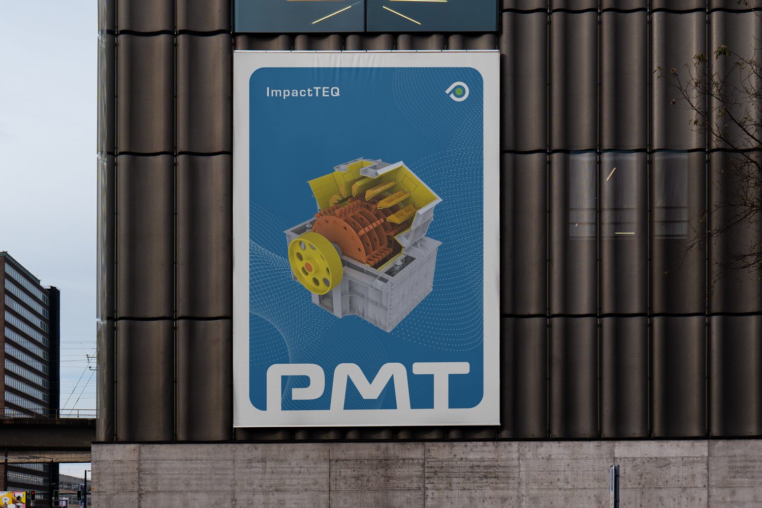 An advertisement for PMT on a building.