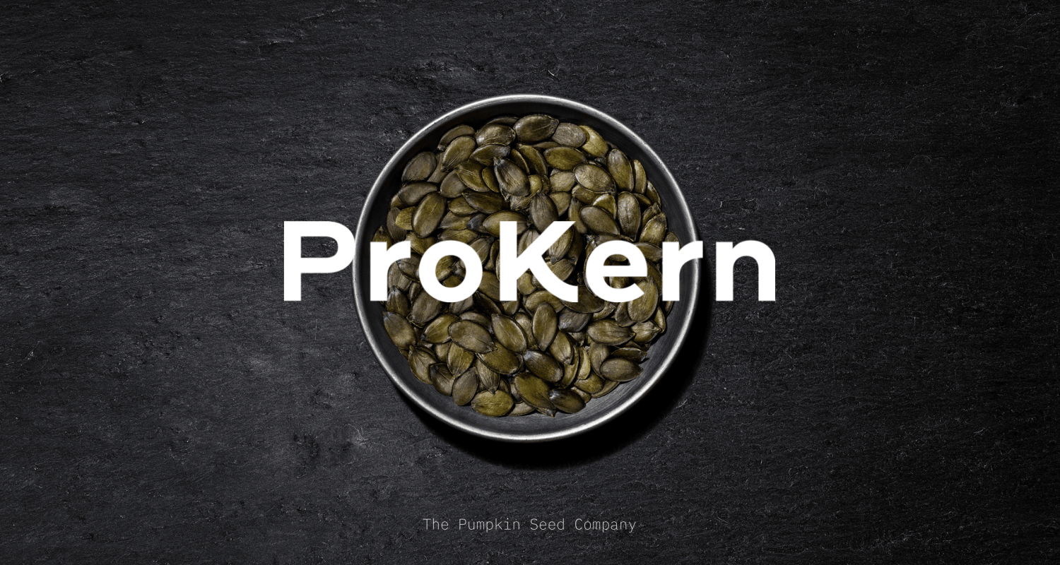 A bowl of pumpkin seeds with the word 'ProKern' on it.