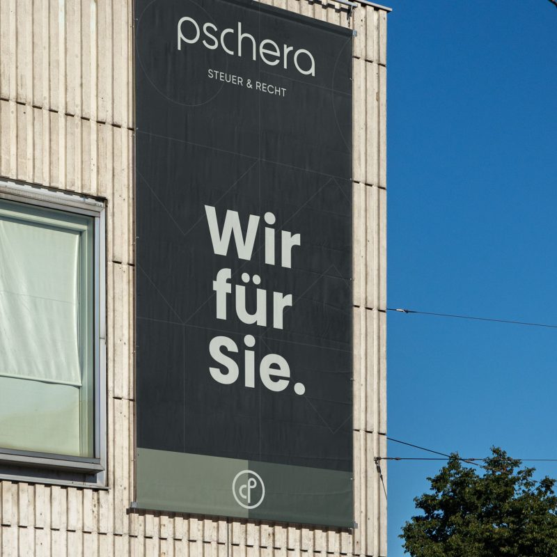 A PMT building with a sign that says poshero.