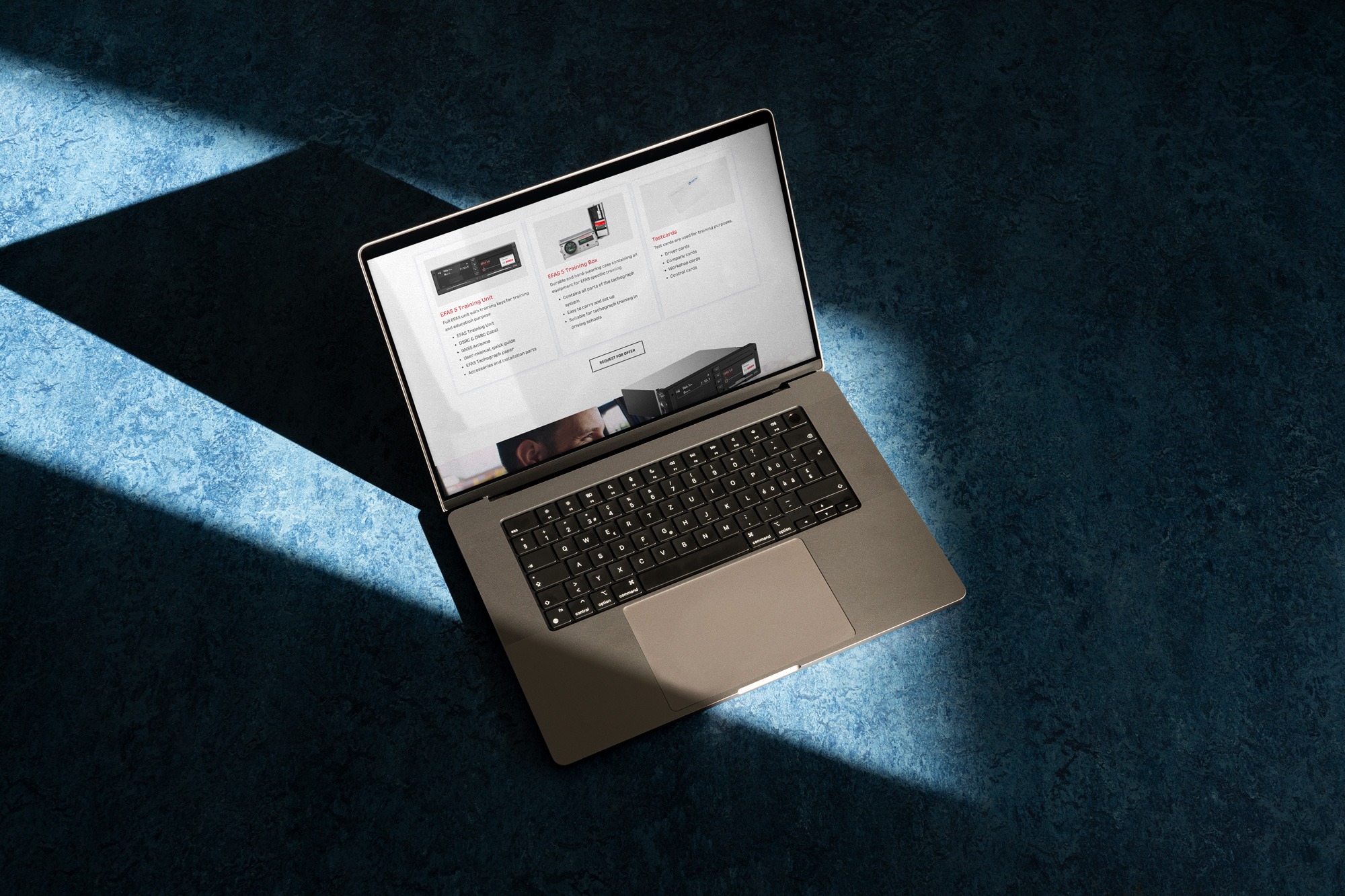 An Intellic laptop on a blue surface.