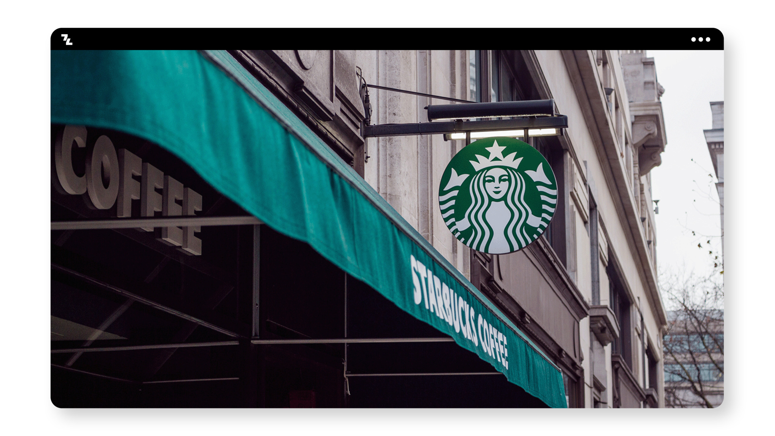 A building with a Starbucks sign exemplifying branding.