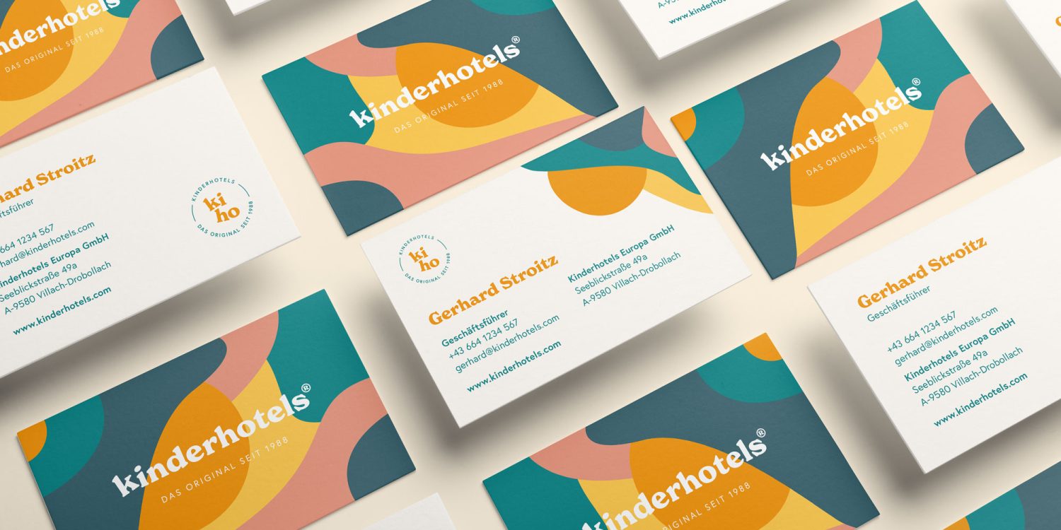 A set of business cards with different shapes and colors designed in Graz.