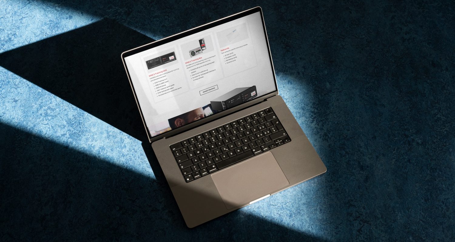 An Intellic laptop on a blue surface.
